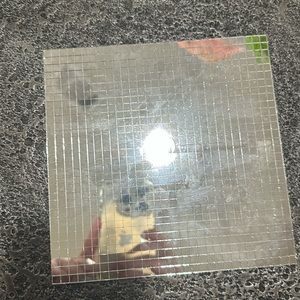 Mirror sheets to make disco themed items.